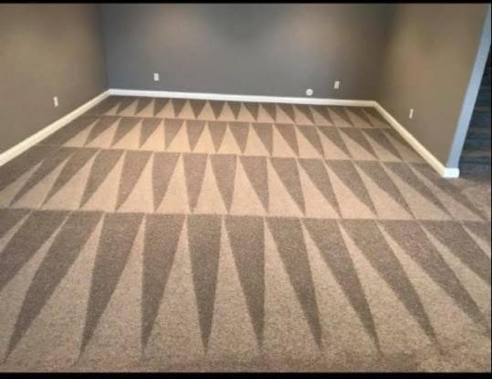 A bright living room with clean carpets.